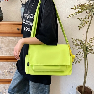 Neon green large capacity oxford messenger bag with crossbody strap for casual outdoor use