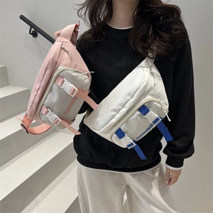 Versatile color-block nylon crossbody chest bag with adjustable strap for sports and travel