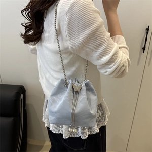 Blue marble texture drawstring bucket bag with silver butterfly buckle and chain strap