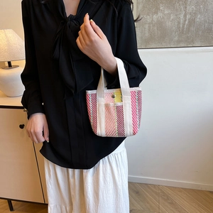Mini striped woven tote bag with canvas handles and metallic snap closure