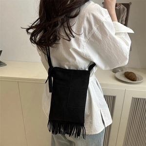 Vintage black faux suede mini crossbody phone bag with stylish fringes and retro design