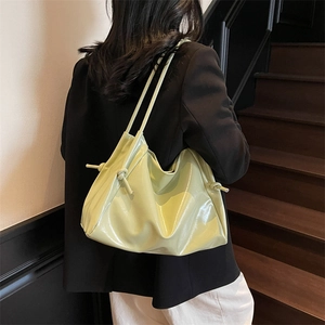 Fashionable light green tote bag with knotted shoulder strap for women casual style