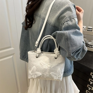 White lace tote bag with 3D butterfly floral embroidery and adjustable strap