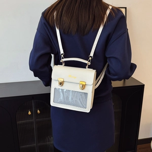 Chic white faux leather mini backpack with dual gold clasps and mesh pocket