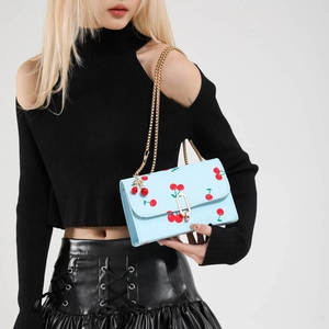 Fashionable light blue saddle bag with cherry print and golden chain strap for women
