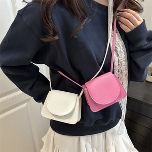 Mini stylish crossbody bag in white and pink leather for fashion summer outfit look