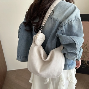 White corduroy crossbody dumpling bag with matching round coin purse for women