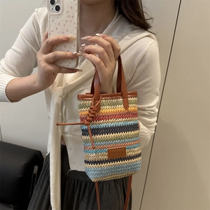Chic rainbow striped straw crossbody phone bag with fashion label and leather handles