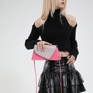 French vintage style pink triangular crossbody bag with sparkling silver glitter flap