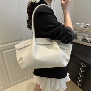 Minimalist white large glossy tote bag with pleated design and metal buckle for women