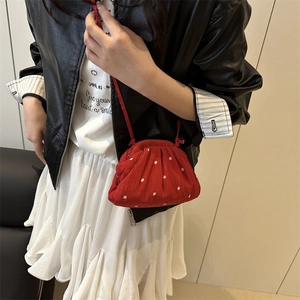 Red ruffle shoulder bag with white floral pattern and drawstring strap for 2025 summer