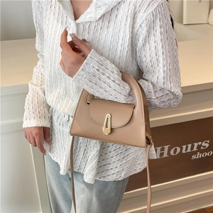 Minimalist khaki trapeze handbag for women with gold clasp and adjustable crossbody strap