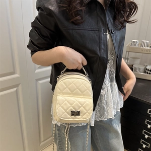 Chic beige quilted mini backpack with metal chain straps and front twist lock pocket