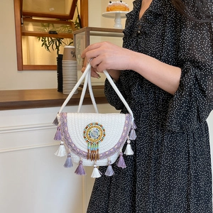 Bohemian white woven straw handbag with purple tassels and beaded embroidery disc