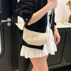 Minimalist cream woven butterfly shoulder bag with a stylish crescent shape for women