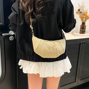Summer woven half-moon shoulder bag with metal butterfly accent and chain strap