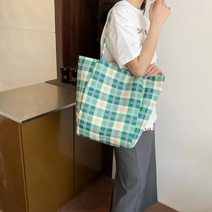 Chic green checkered tote bag with large capacity and durable canvas straps for women
