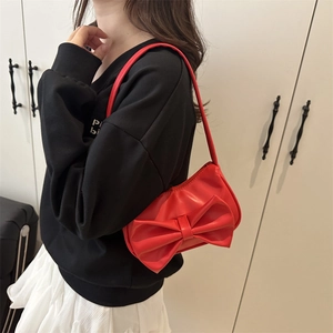 Fashionable red underarm shoulder bag with large bow decoration for elegant summer style