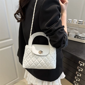 Elegant white quilted crossbody bag with gold chain strap and top handle for women