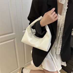 Stylish white glossy crescent hobo bag for women with polished patent leather finish