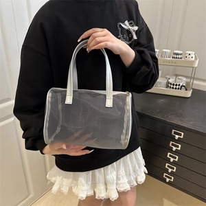 Modern semi-transparent silver grey mesh tote bag with reinforced top handles for women