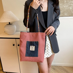 Retro red and white plaid tote bag with denim pocket and colorful woven handles
