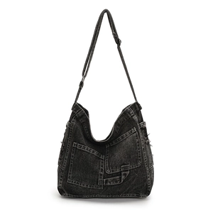 Washed dark gray denim hobo bag with fringe pockets and adjustable shoulder strap