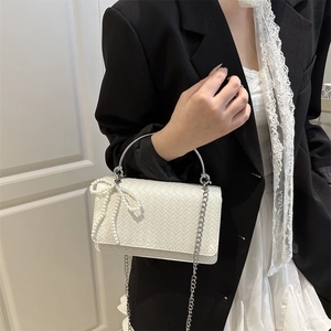 White woven handbag with pearl bow and metal ring handle for women stylish cross-body bag