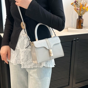 Elegant light blue square handbag with sequined flap and golden clasp for women