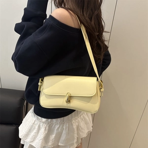 French style creamy yellow leather underarm bag with gold metal buckle for women