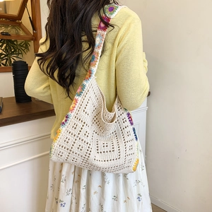 Handmade crochet tote bag with colorful floral borders and openwork woven texture for women