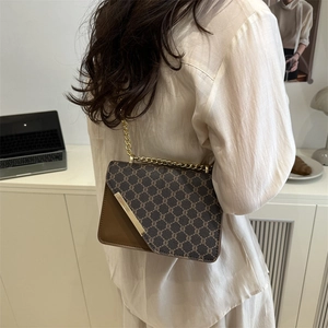 Classic vintage shoulder bag with monogram print and gold chain strap for women