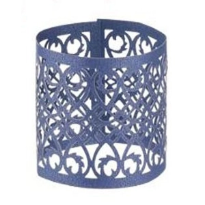 Close-up of laser-cut dark blue napkin ring with intricate vine and heart patterns