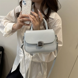 Minimalist light blue square handbag with silver metal lock for women stylish commuter look