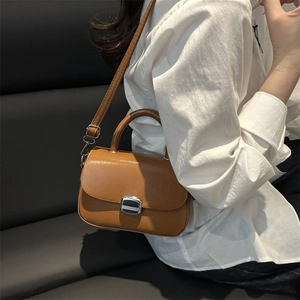 Minimalist tan square handbag for women with silver buckle and adjustable shoulder strap