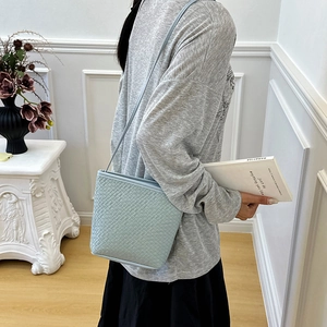 Fashionable summer mint blue woven bucket bag with crossbody strap for women