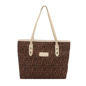 Grand sac cabas à imprimé léopard en toile épaisse avec anses en cuir en vue de face