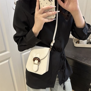 Retro cream white crossbody bag with dark wood horseshoe buckle and thin strap