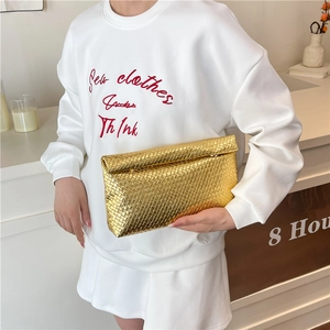 Elegant gold woven texture clutch bag with minimalist envelope flap design for women