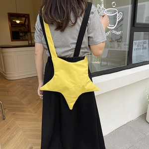 Borsa a tracolla gialla a forma di stella in tela con spalline asimmetriche alla moda