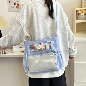 Light blue large capacity Ita bag with transparent PVC windows for doll display