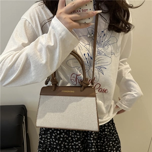 Chic two-tone handbag with faux leather stitching and large capacity for women
