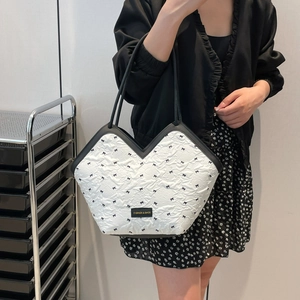 Summer large capacity tote bag featuring black bow patterns and elegant lace textures