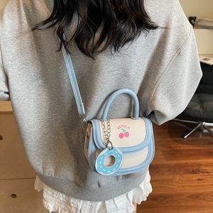 Cute contrast-color crossbody bag with cherry print and donut charm for summer