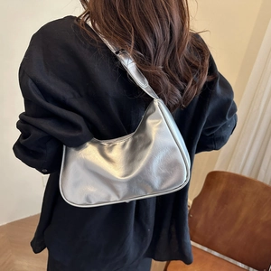Minimalist silver metallic hobo shoulder bag with a sleek pleated leather texture for women