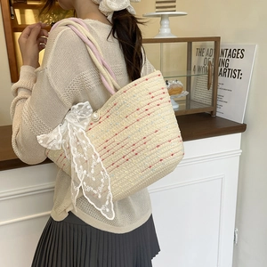 Handwoven basket bag with lace bow and pearl detail for fashion women crossbody use