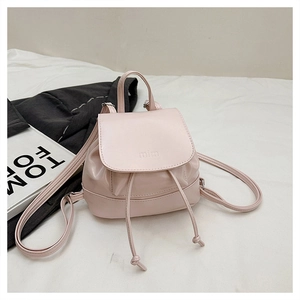 Detail of light pink mini backpack with mim logo drawstring and adjustable strap