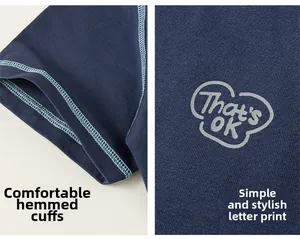 Detail view of navy cotton t-shirt with bound cuffs and That's OK letter print
