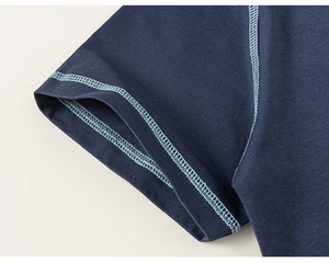 Detailed macro view showing the navy blue sleeve cuff with contrast light blue stitching