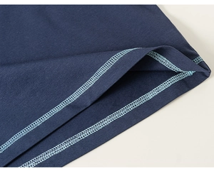 Detail shot of navy cotton T-shirt showing high-quality mint blue double-needle stitching